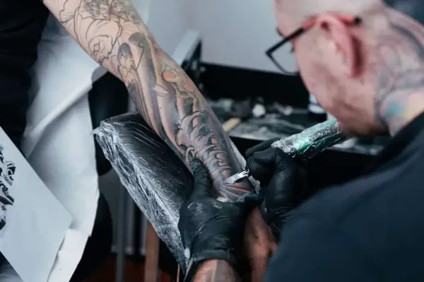 Ergonomic Excellence: How Tattoo Arm Rests Improve Artist Performance and Client Experience