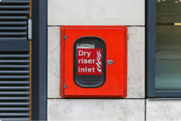 Dry Riser Systems: Why the Door Is Just as Important as the Pipes